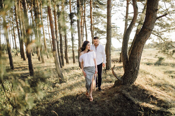 Young couple in love walking in the park