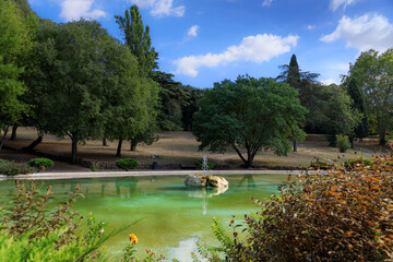 Villa borghese Garden in Rome, Italy: view of english garden with the Oval Fountain.