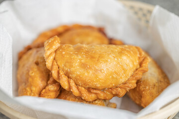 Close up of fried argentinian empanadas.