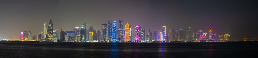 Fototapeta na wymiar Skyline of Doha (capital city of Qatar) at night