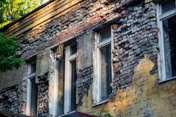 Collapsing outer wall of an old brick building