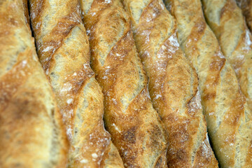 Stack of crispy baguettes at the bakery