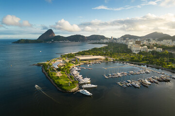 View of Marina da Gloria With Ships and Yachts in Guanabara Bay, and the Sugarloaf Mountain in the Horizon, in Rio de Janeiro, Brazil - obrazy, fototapety, plakaty