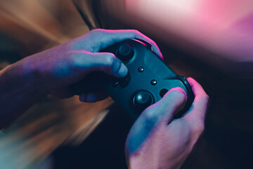gamer player with joystick to play a game, digital online gaming streaming, e-sports challenge,...