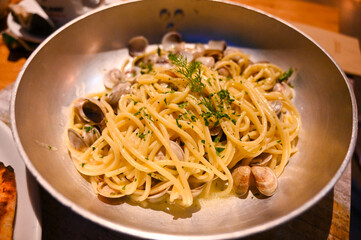 Spaghetti and shells served in Italian restaurant. Shell pasta. 