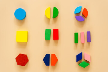 Fractions on beige background. Back to school, fun education concept Set of supplies for...