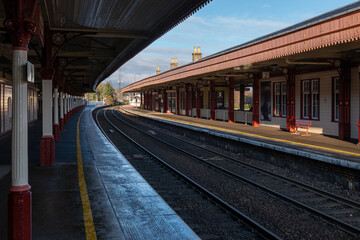 Fototapeta na wymiar 5 December 2022. Aviemore, Highlands and Islands,Scotland. This is Aviemore Railway Station, The Strathspey Railway on a sunny afternoon.