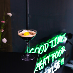 Fresh juice with decoration on it on dark background