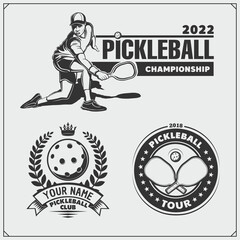 Pickleball labels, emblems, badges, design elements and silhouette of player. Black and white.