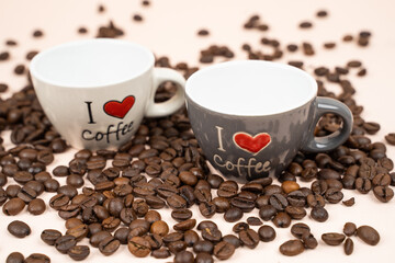 a mug filled with coffee beans with the inscription i love coffee