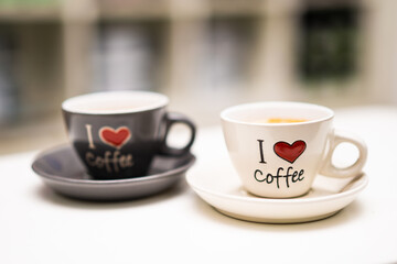 a mug for coffee with the inscription i love coffee