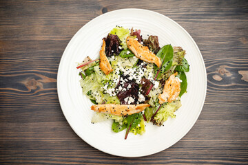 tasty and fresh meat salad on a plate in a restaurant from a chef.