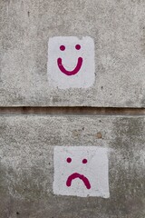 Fototapeta na wymiar ace of hearts on the wall. smileys. smiley face. graffiti 