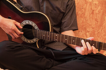 Obraz na płótnie Canvas ギターを演奏する手元　guitar