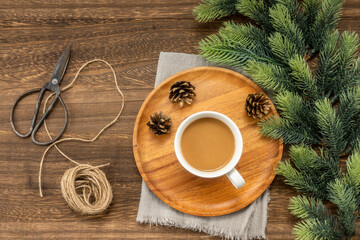Christmas decorations and coffee on  wooden background. christmas concept.