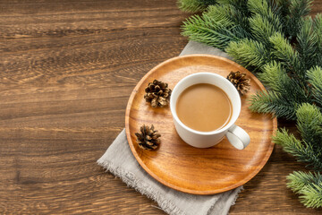 Christmas decorations and coffee on  wooden background. christmas concept.