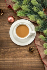 Obraz na płótnie Canvas Christmas decorations and coffee on wooden background. christmas concept.