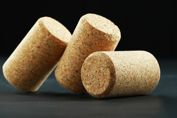 Corks of wine bottles on grey table, closeup