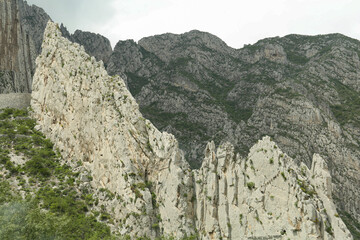 Picturesque landscape with high mountains under beautiful sky