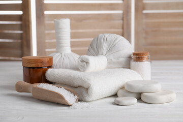 Fototapeta na wymiar Spa composition with skin care products on white wooden table
