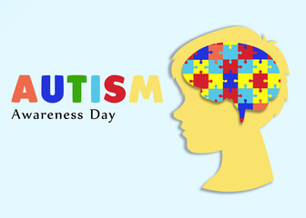 World Autism Awareness Day. Silhouette of boy with puzzle pieces in his head on light blue...