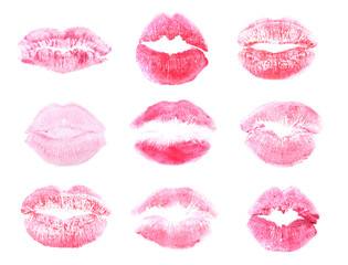Set with lipstick kiss marks on white background, top view