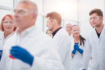 group of researchers working on a new vaccine.