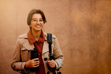 Portrait of young businesswoman outdoors looking at camera.