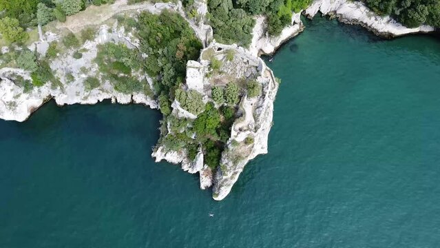 Aerial drone view of ruins of old fortress of Duino Castle near Trieste city