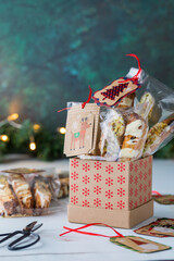 Creating treat bags of homemade biscotti as gifts for the holidays.