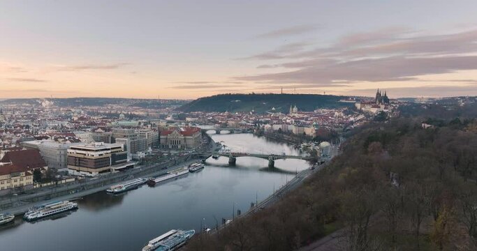 Sunrise at Panoramic view Prague oldtown with bridge, nautre and Prague castle, city river and bridge on the water skyline