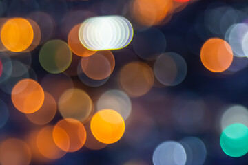 Abstract city lights blur blinking background. Soft focus horizontal long banner. Bokeh sparkles colorful defocused.