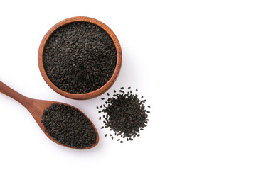 Black sesame seeds in wooden bowl and spoon isolated on white background , top view , flat lay.
