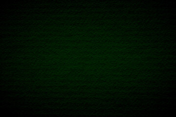 Green dark concrete texture wall background on black. Wallpaper pattern curved rough dark cement stone. 