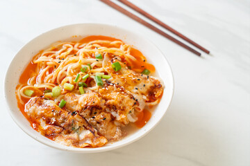 ramen noodles with gyoza or pork dumplings