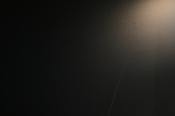 brown wall background with lights and black shadow