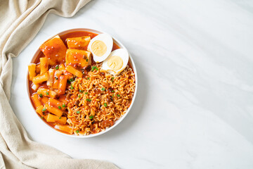 Korean instant noodles with Korean rice cake and fish cake and boiled egg