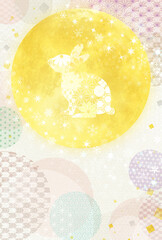 和紙背景に干支のうさぎ柄の年賀状素材