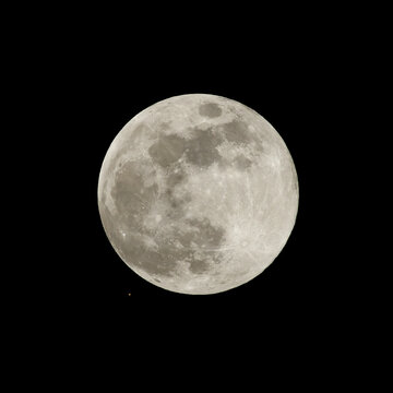 Full moon and Mars, lower left corner, shown shortly prior to occultation by the moon. Observed on December 7, 2022, from Pasadena in California.