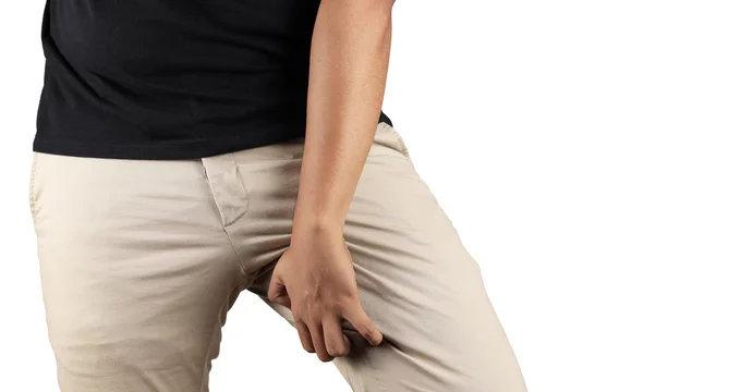 Women are scratching the crotch, itching crotch, Concept with healthcare  and medicine. Stock Photo