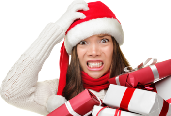 Christmas stress - busy woman wearing Santa hat stressing for Christmas shopping holding many Christmas gifts. Funny image of Asian Caucasian model isolated cutout PNG on transparent background.
