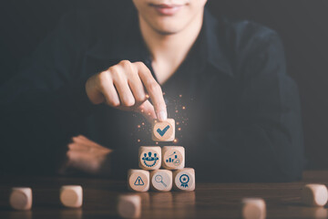 best quality assurance concept for product assurance, standard quality. business insurance Industry Certification,Guarantee, Product Certification Management,Businessman holding a wooden block