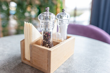 Seasonings on the table in the cafe.