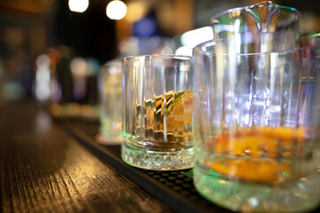 Glasses and dishes on the bar in a cafe.