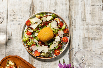 Mixed salad with parmesan cheese and tofu cheese