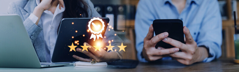 Hand shows the sign of the top service Quality assurance 5 star, Guarantee, Standards, ISO certification and standardization concept.