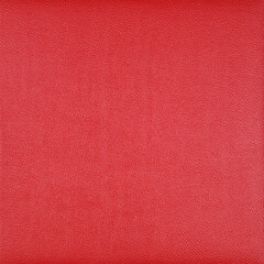 Red textured leather background .top view ,flat lay