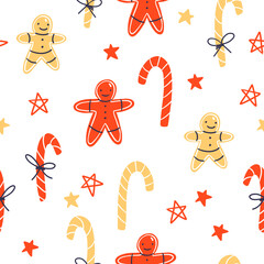 Fototapeta premium Vector seamless pattern with bright red and yellow gingerbread men and striped canes and stars. Ideal for Christmas holidays cards, posters, banners and other graphic and web design
