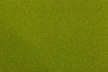 Green glitter background texture white sparkling shiny wrapping paper for Christmas holiday seasonal wallpaper decoration, greeting and wedding invitation card design.