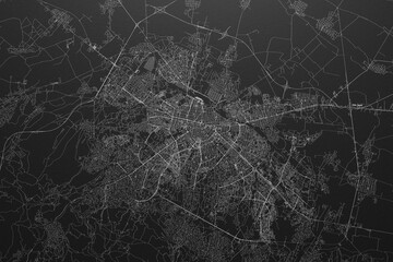 Street map of Sofia (Bulgaria) on black paper with light coming from top
